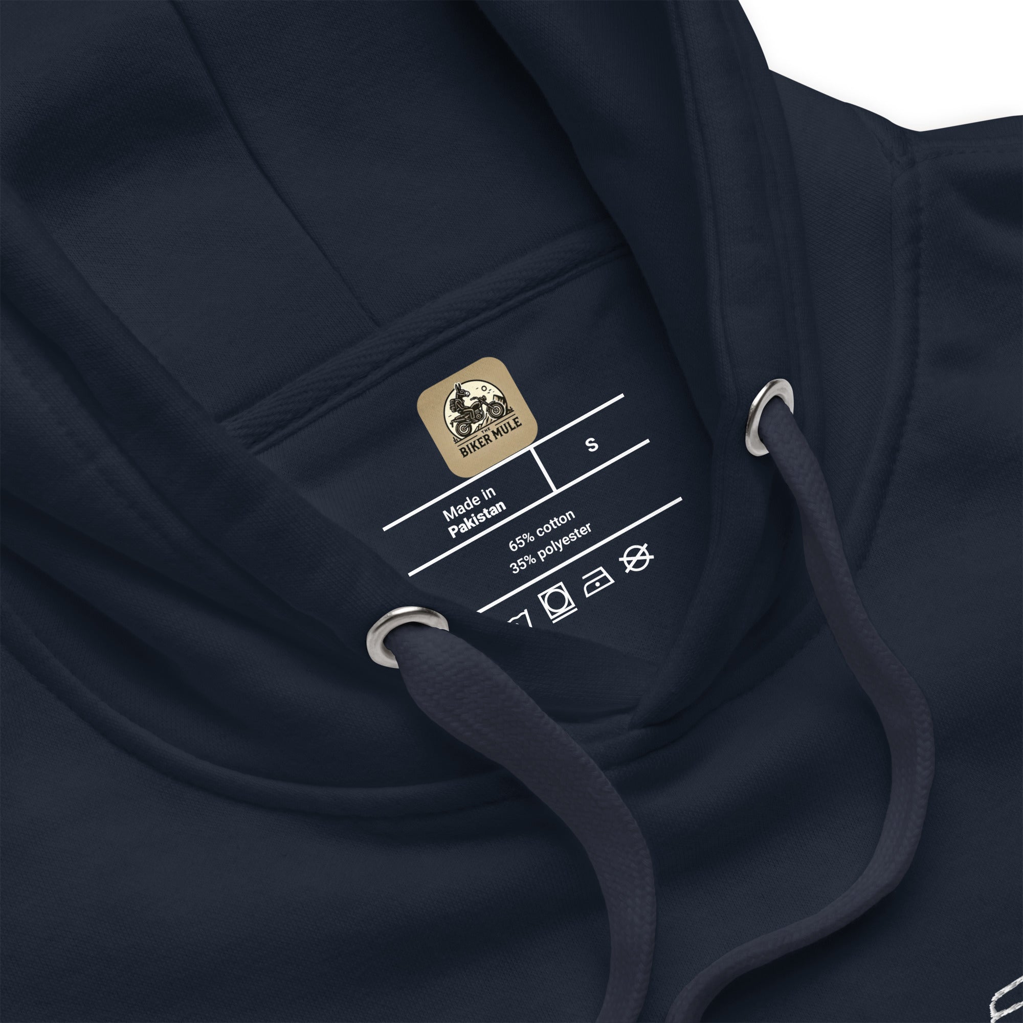 Close-up of The Biker Mule motorcycle style hoodie in black showing label and drawstrings