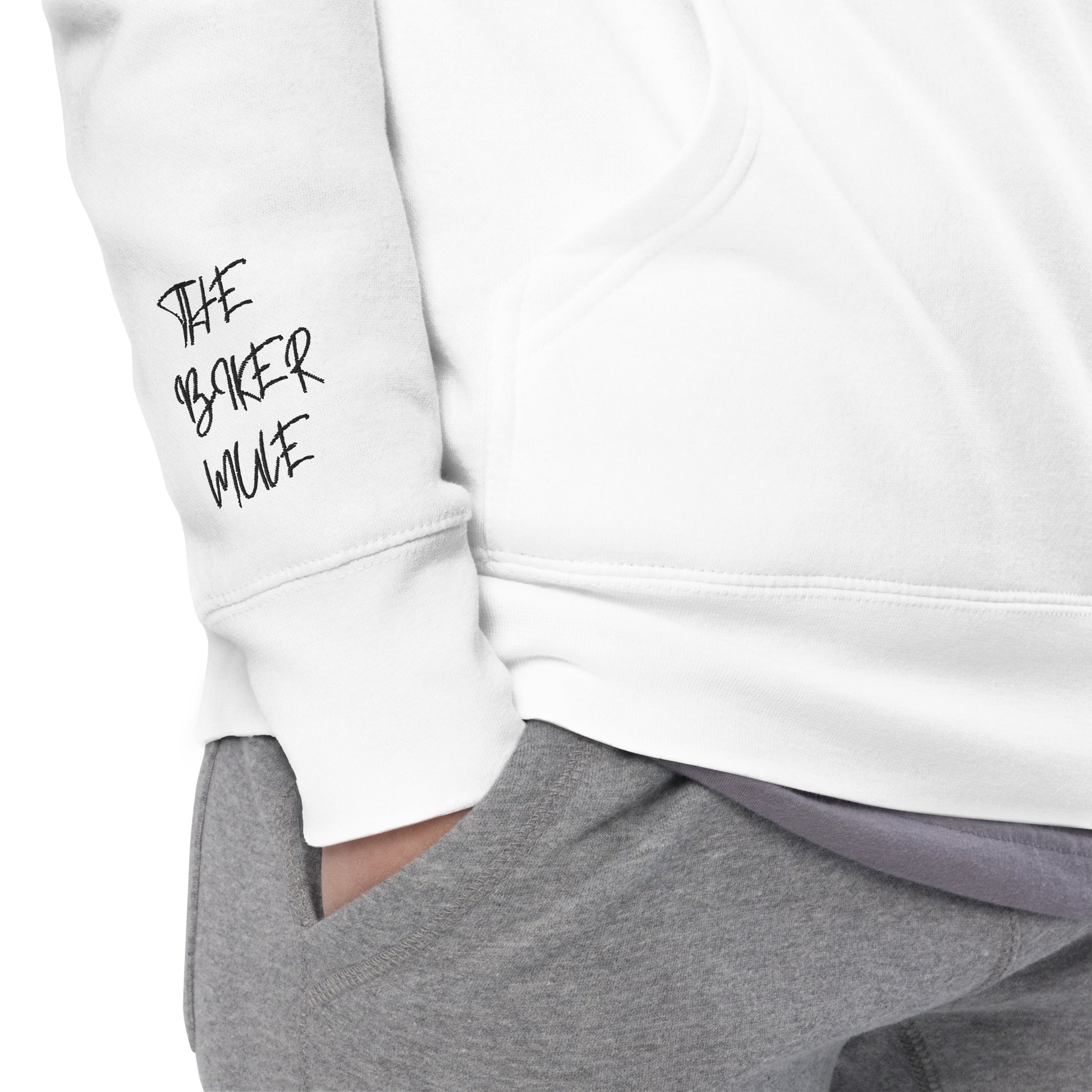 White motorcycle themed hoodie from The Biker Mule with logo on sleeve and gray pants