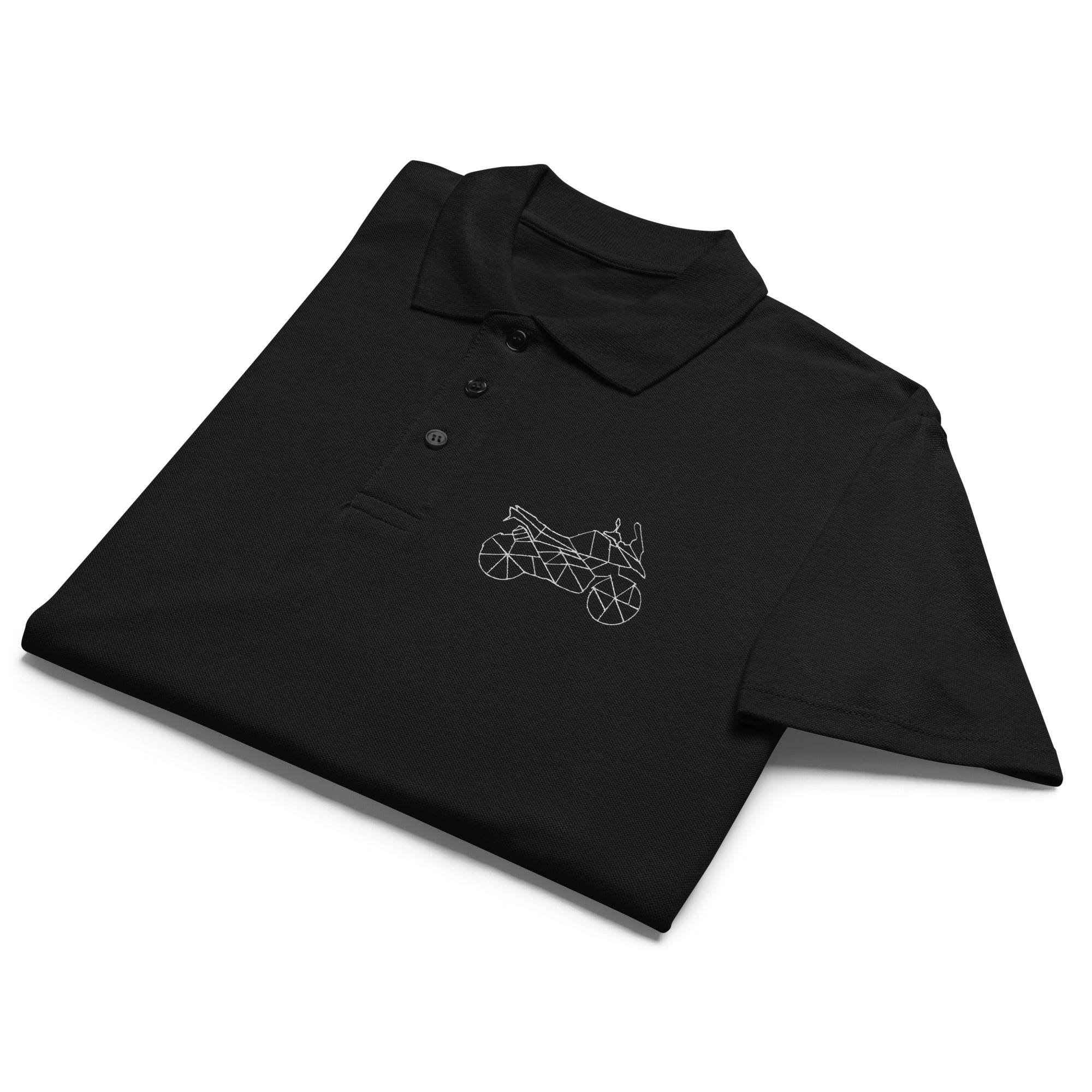 Black motorcycle polo shirt men with geometric motorcycle design from The Biker Mule folded neatly