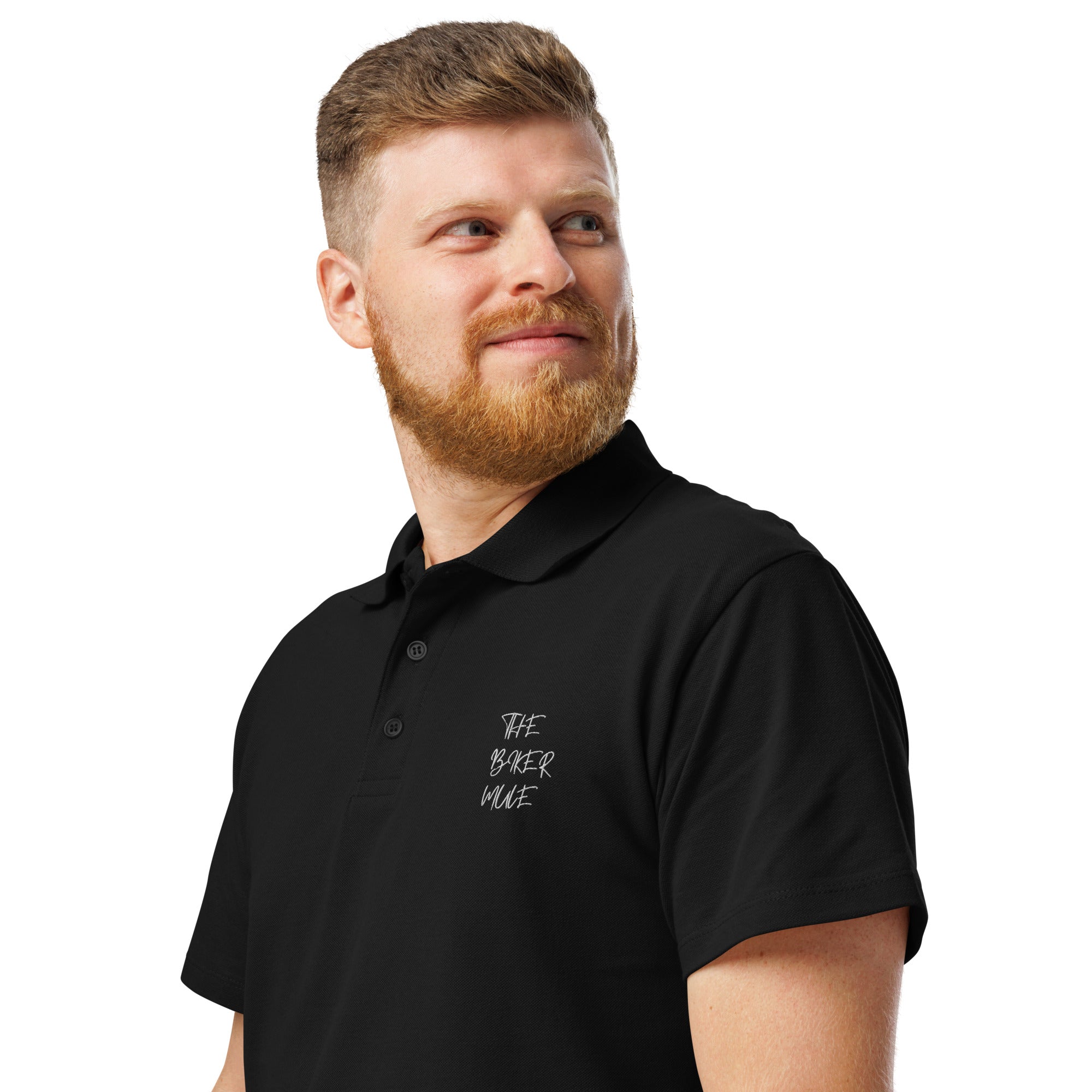 The Biker Mule black motorcycle polo shirt with embroidered logo worn by a man