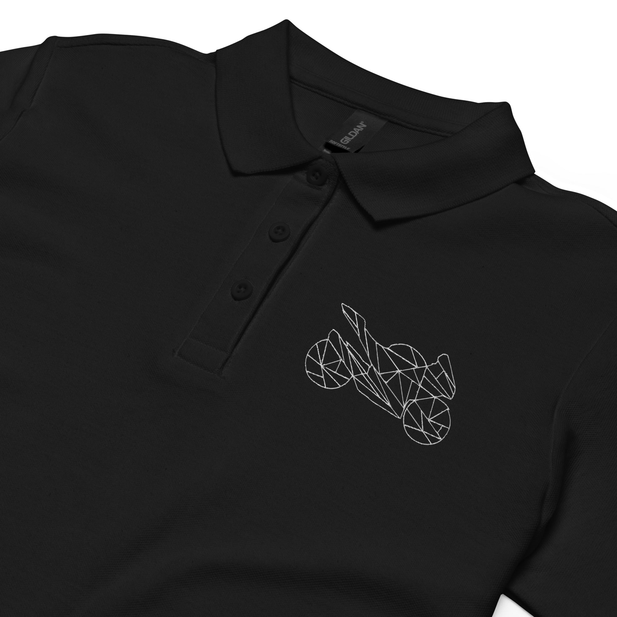 Black women motorcycle polo shirt with geometric motorcycle design on chest from The Biker Mule